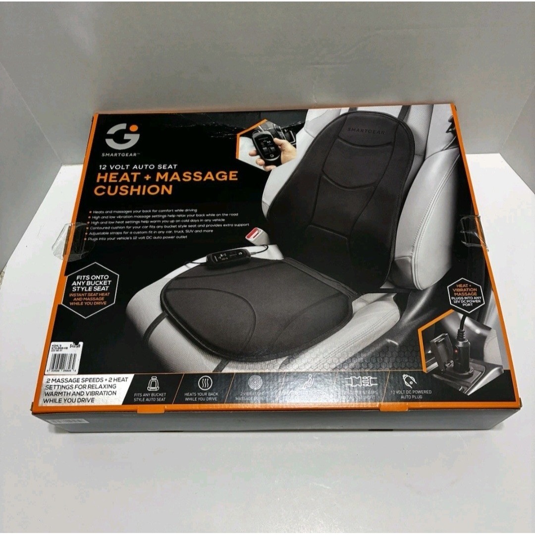 Para foteli kubełkowych w kolorze antracytowym ustawiona przy stole jadalnym